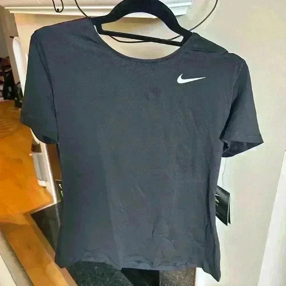 Nike women’s athletic short sleeve tee, black, medium - Picture 1 of 4